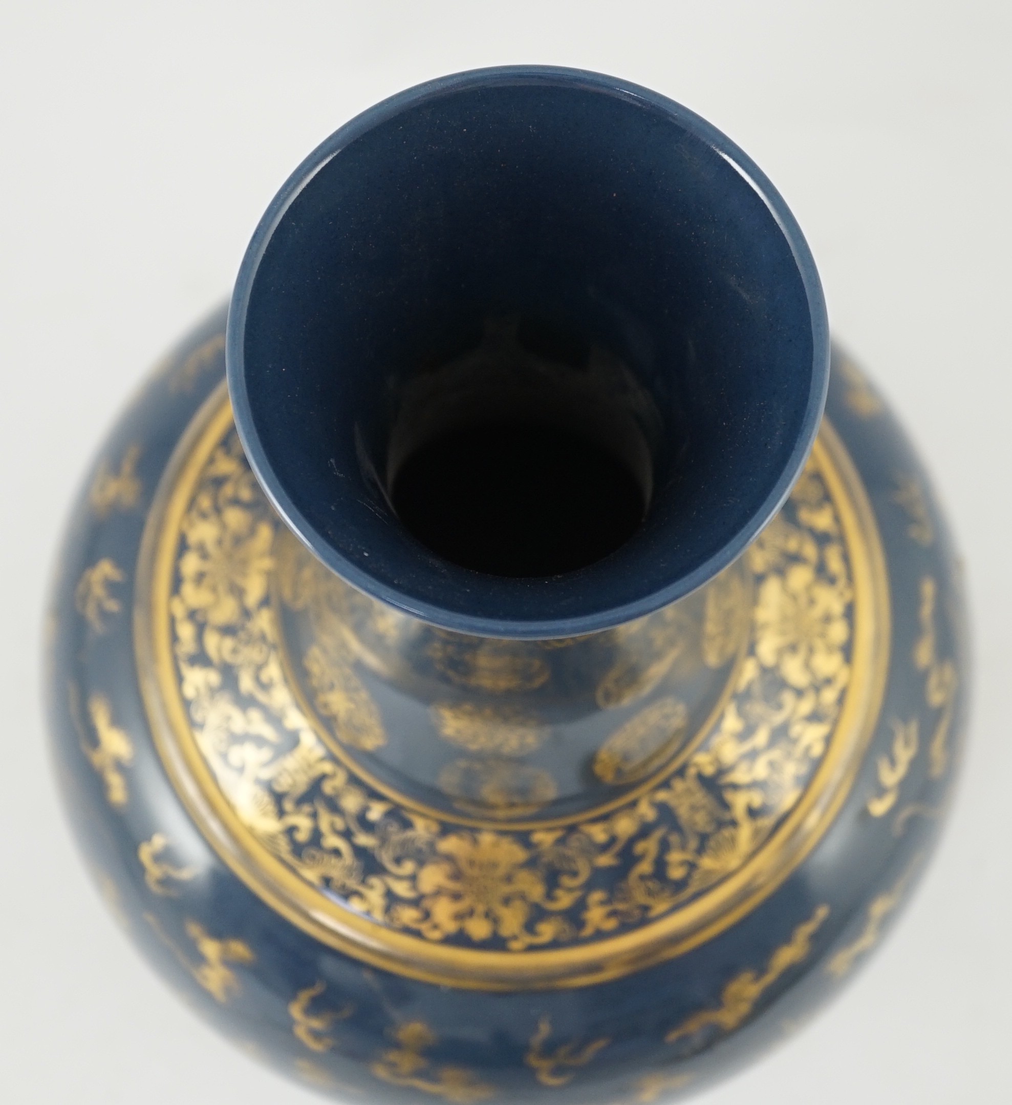 A Chinese gilt decorated blue ground ‘dragon’ vase, Guangxu mark but later, 38.5cm high, wear to gilding